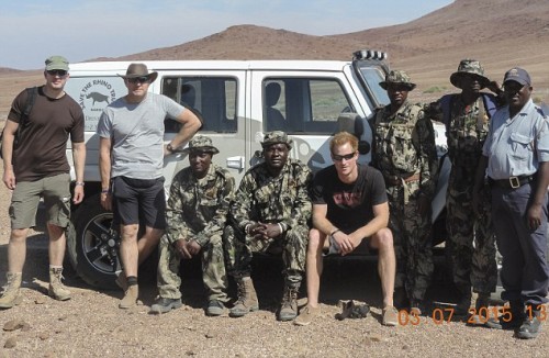 DESERT RHINO CAMP, NAMIBIA. 5 JULY 2015 Prince Harry (centre right) with the team he spent 5 days with in the North West of Namibia tracking Rhino and Lions. He is the guy in camo sitting next to Harry. Harry's right PICTURE: SIMSON URI-KHOP