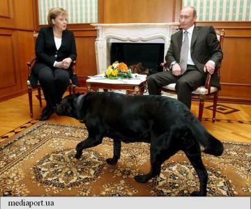 Vladimir Putin NU a vrut sa o sperie pe Angela Merkel cu cainele sau